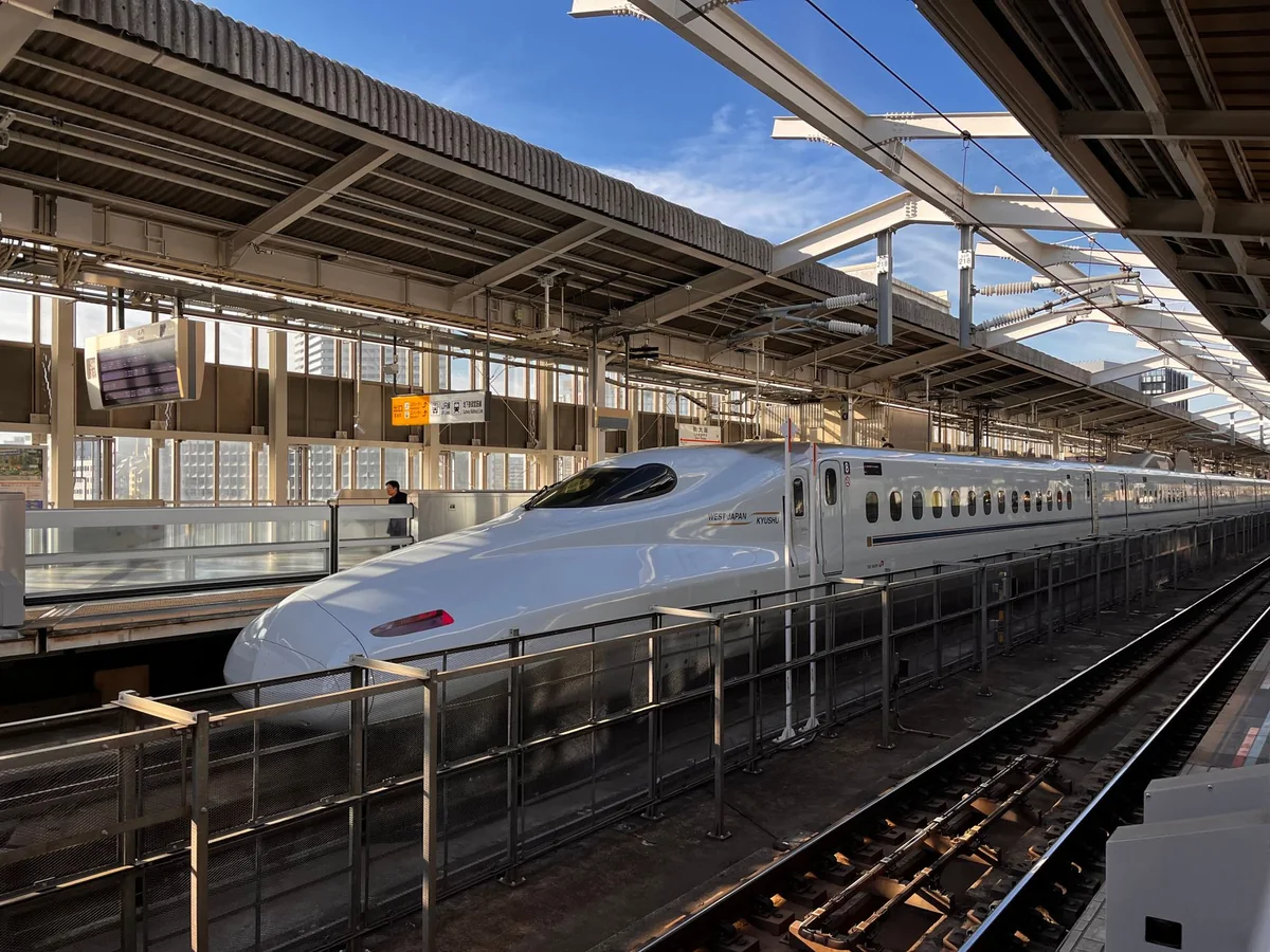 A shinkansen bullet train at a Japanese station platform